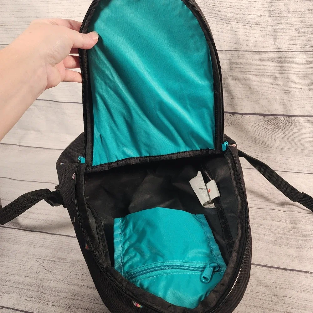 Dakine Cosmo 6.5L Mini Backpack Black Rainbow Toucan Pattern 8210060 Daypack